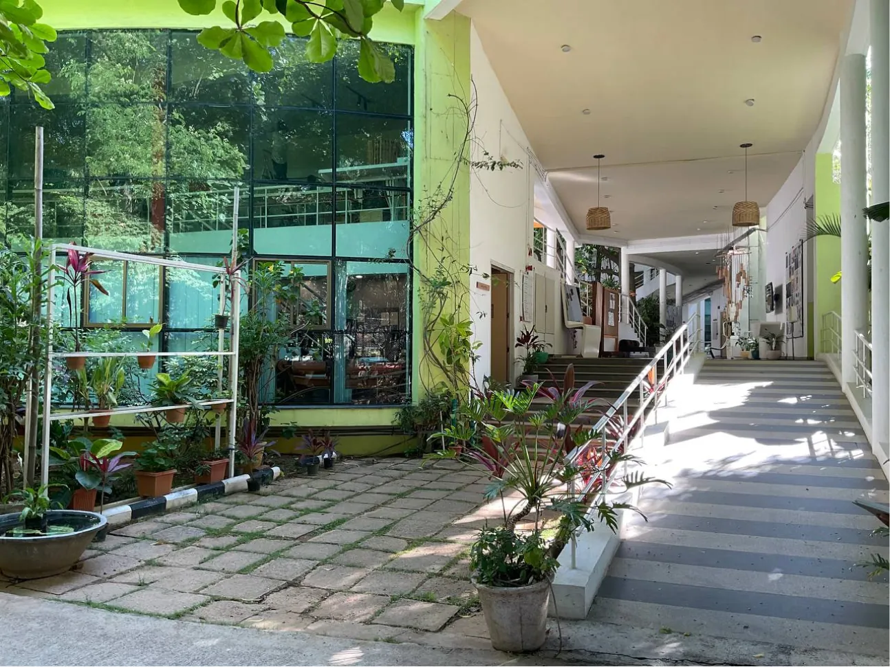 Corridor beside the garden with a sign location marked in pink